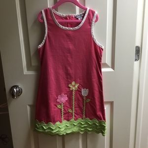 A pink flower dress.